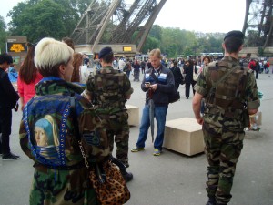 Regine Bechtler wearing one of her military peace jackets while in Paris waiting to see the eiffel tower